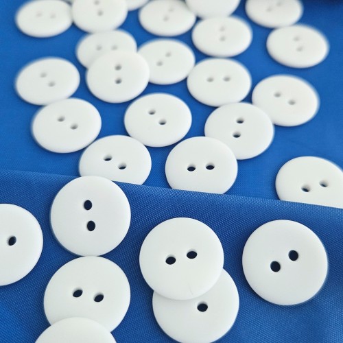 Пуговица P-002. 18 мм/2. белый матовый (уп. 12 шт)