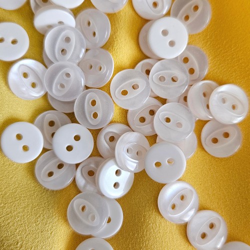 Пуговица P-A1401. 11.5 мм/2 белый (уп. 12 шт)