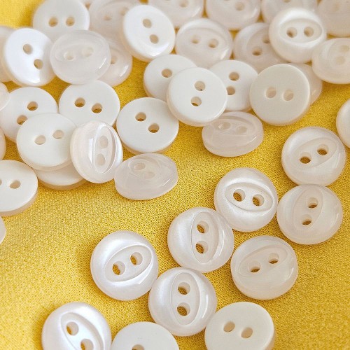 Пуговица P-A1401. 9 мм/2 белый (уп. 12 шт)