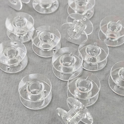 Шпулька для бытовых швейных машин пласт. (набор 10 шт. прозрач.)